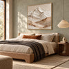 White Mountain Peak and Tan Foothills Wall Art shown above a bed with brown bedding.
