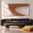 Wide Rust Curved Ridge Abstract Painting shown in a living room with a sofa.