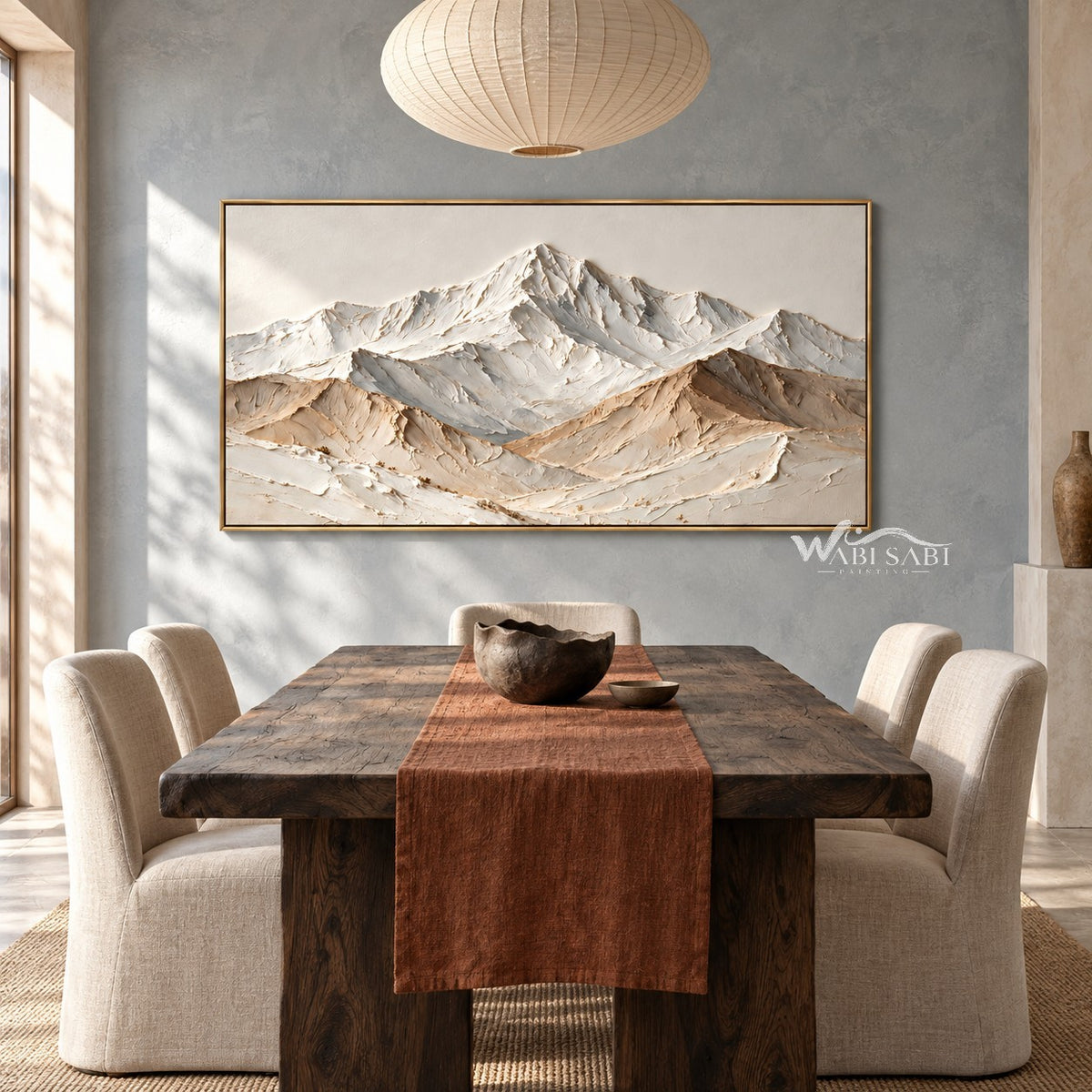 Wide White Mountain Range Wall Art shown behind a wood dining table.