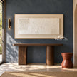 Wide White Texture Panel with Dotted Insets shown above a wood console on a dark wall.