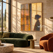 Window at Dusk with a Figure in Profile shown above a dark green sofa.