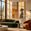 Window at Dusk with a Figure in Profile shown above a dark green sofa.