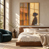 Window at Dusk with a Figure in Profile shown above a bed with neutral bedding.